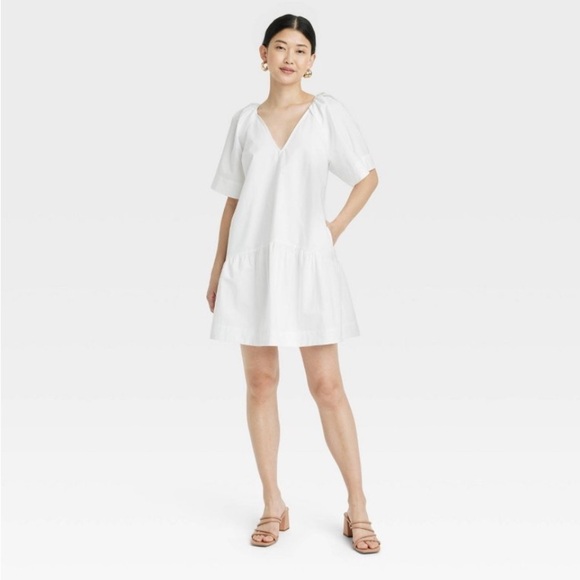 a new day Dresses & Skirts - Women's Flutter Short Sleeve Mini Poplin
Dress - A New Day™ White new